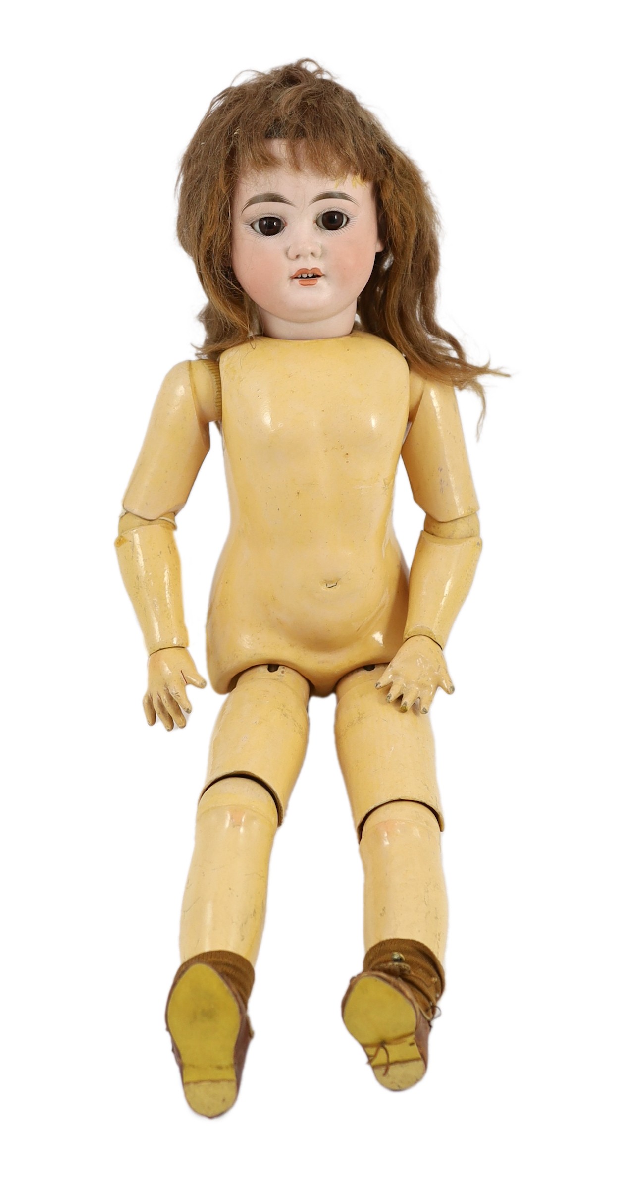 An Armand Marseille bisque doll, German, circa 1894, 20in.